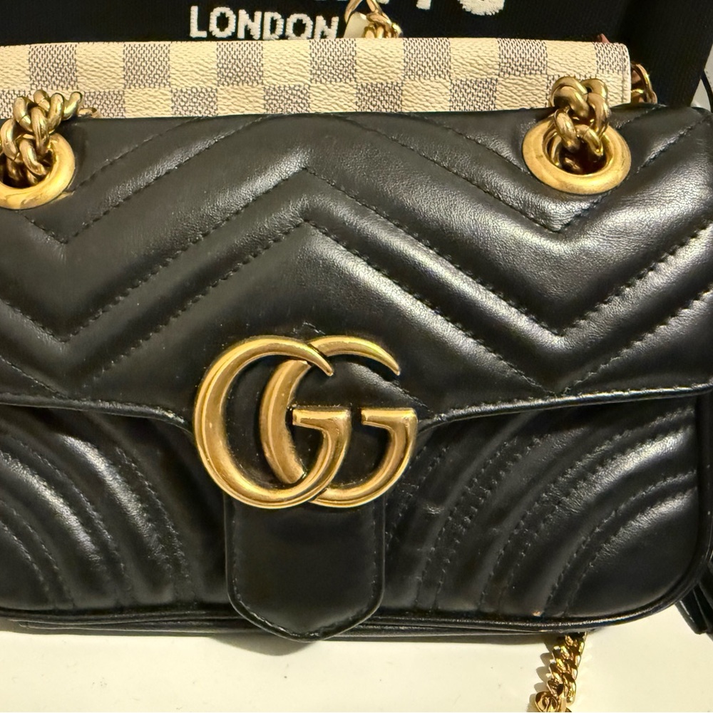 Gucci Black Crossbody Bag with Gold Accents